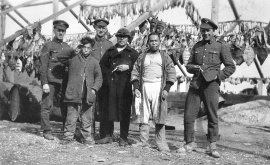 Canadian soldiers and local fishers